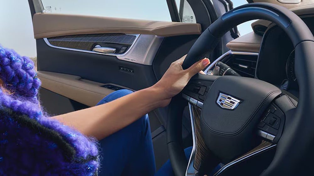 Shop Our Inventory from Cadillac of New Orleans - Woman in Cadillac